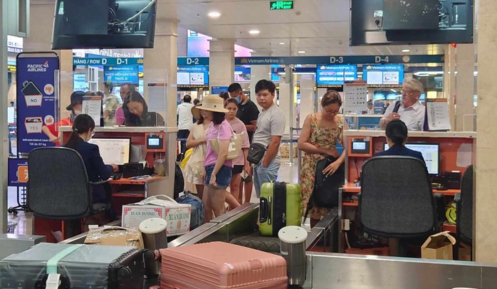 Hành khách bay Tết tại Tân Sơn Nhất cần lưu ý gì?- Ảnh 1. Hành khách bay Tết tại Tân Sơn Nhất cần lưu ý gì?- Ảnh 1.