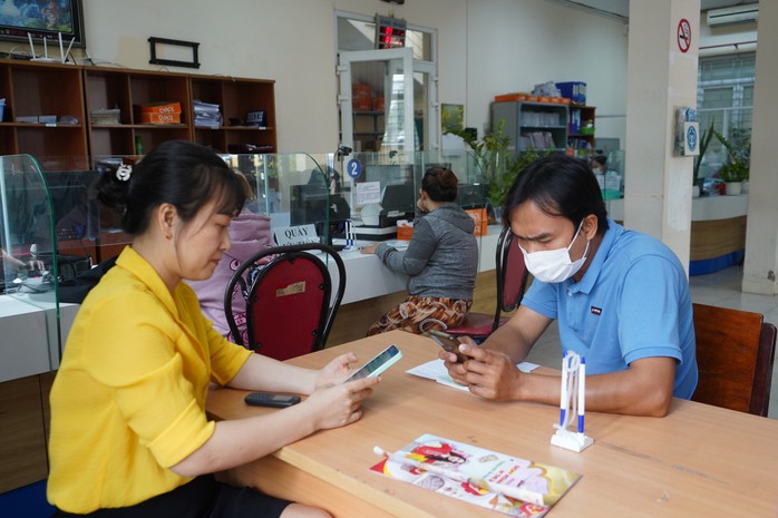 Điều chỉnh lãi suất tính lãi chậm đóng BHYT- Ảnh 3. Điều chỉnh lãi suất tính lãi chậm đóng BHYT- Ảnh 3.