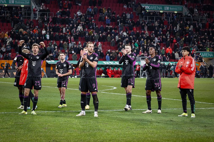Kane giúp Bayern vượt qua Augsburg, hướng tới kỷ lục mới tại Bundesliga- Ảnh 1. Kane giúp Bayern vượt qua Augsburg, hướng tới kỷ lục mới tại Bundesliga- Ảnh 1.