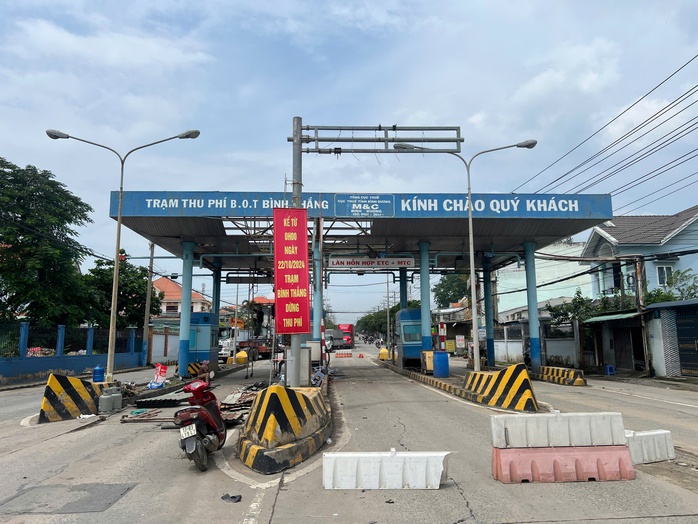 Tháo dỡ một trạm thu phí BOT ở Bình Dương- Ảnh 1. Tháo dỡ một trạm thu phí BOT ở Bình Dương- Ảnh 1.
