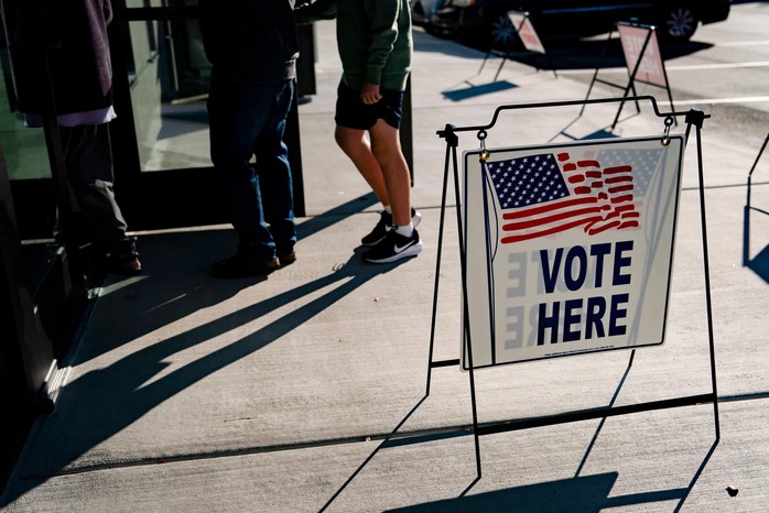 Voters wait in line to cast their ballots during the first day of early voting at a polling station in Wilmington, North Carolina, on Oct. 17, 2024.Photographer: Allison Joyce/Bloomberg Voters wait in line to cast their ballots during the first day of early voting at a polling station in Wilmington, North Carolina, on Oct. 17, 2024.Photographer: Allison Joyce/Bloomberg