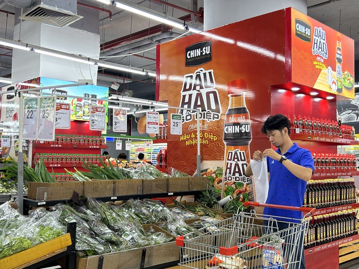 Chuỗi siêu thị của tỉ phú Nguyễn Đăng Quang bắt đầu "mang tiền về cho mẹ"- Ảnh 1. Chuỗi siêu thị của tỉ phú Nguyễn Đăng Quang bắt đầu "mang tiền về cho mẹ"- Ảnh 1.