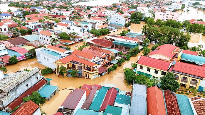 Hơn 20.000 nhà dân bị ngập sâu ở Quảng Bình: Làng mạc "xứ Lệ" chìm trong biển nước- Ảnh 11. Hơn 20.000 nhà dân bị ngập sâu ở Quảng Bình: Làng mạc "xứ Lệ" chìm trong biển nước- Ảnh 11.