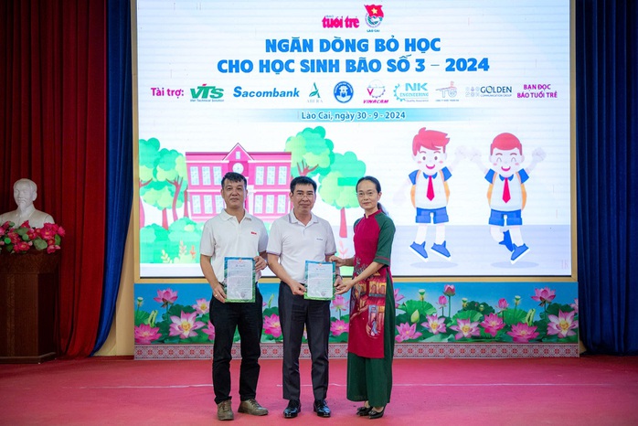 Nhân viên Sacombank ủng hộ 1 ngày lương giúp đồng bào vượt thiên tai- Ảnh 2. Nhân viên Sacombank ủng hộ 1 ngày lương giúp đồng bào vượt thiên tai- Ảnh 2.
