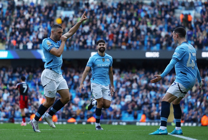 Arsenal, Man City ngược dòng thắng đậm trên sân nhà- Ảnh 8. Arsenal, Man City ngược dòng thắng đậm trên sân nhà- Ảnh 8.