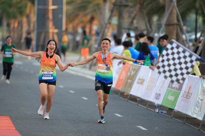 Gần 3.000 vận động viên chinh phục cung đường biển marathon Phan Thiết- Ảnh 4. Gần 3.000 vận động viên chinh phục cung đường biển marathon Phan Thiết- Ảnh 4.