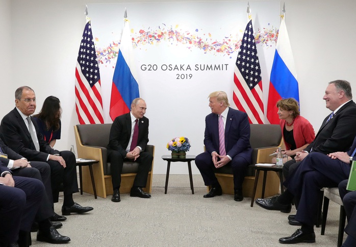 Bên lề Hội nghị Thượng đỉnh G20 tại TP Osaka - Nhật Bản hồi tháng 6-2019 đã diễn ra cuộc gặp Tổng thống Nga Vladimir Putin (thứ 3 từ trái sang) và ông Donald Trump (khi đó là tổng thống Mỹ) Ảnh: Reuters Bên lề Hội nghị Thượng đỉnh G20 tại TP Osaka - Nhật Bản hồi tháng 6-2019 đã diễn ra cuộc gặp Tổng thống Nga Vladimir Putin (thứ 3 từ trái sang) và ông Donald Trump (khi đó là tổng thống Mỹ) Ảnh: Reuters