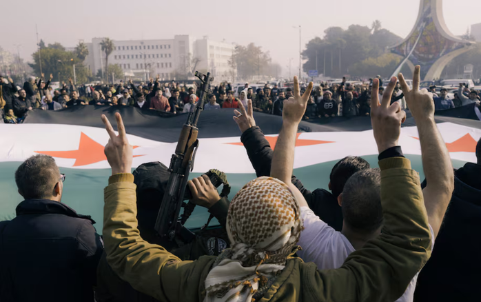 Các tay súng nổi dậy ăn mừng ở Damascus hôm 9-12 sau khi lật đổ ông Assad. Ảnh: Washington Post Các tay súng nổi dậy ăn mừng ở Damascus hôm 9-12 sau khi lật đổ ông Assad. Ảnh: Washington Post