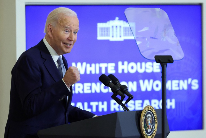 Tổng thống Joe Biden phát biểu tại một hội nghị diễn ra ở Nhà Trắng hôm 11-12. Ảnh: REUTERS Tổng thống Joe Biden phát biểu tại một hội nghị diễn ra ở Nhà Trắng hôm 11-12. Ảnh: REUTERS
