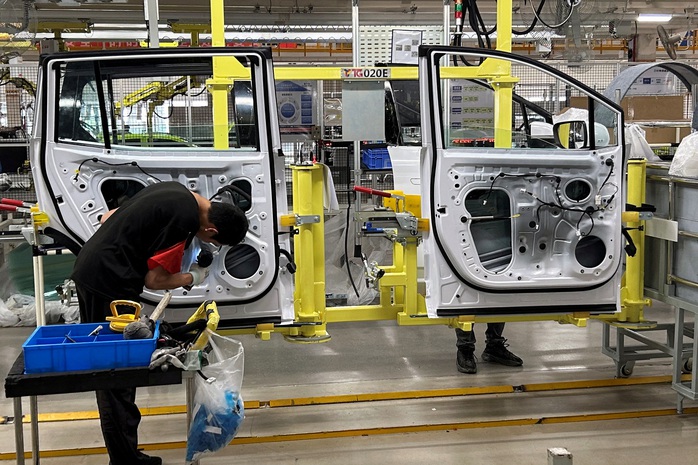 Một nhà máy sản xuất xe điện ở TP Nam Xương, tỉnh Giang Tây - Trung Quốc Ảnh: REUTERS Một nhà máy sản xuất xe điện ở TP Nam Xương, tỉnh Giang Tây - Trung Quốc Ảnh: REUTERS