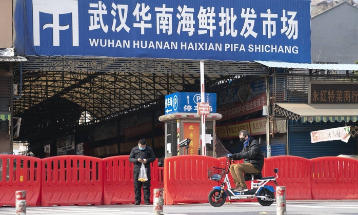 WHO yêu cầu Trung Quốc thực hiện "mệnh lệnh đạo đức và khoa học" liên quan COVID-19- Ảnh 1. WHO yêu cầu Trung Quốc thực hiện "mệnh lệnh đạo đức và khoa học" liên quan COVID-19- Ảnh 1.
