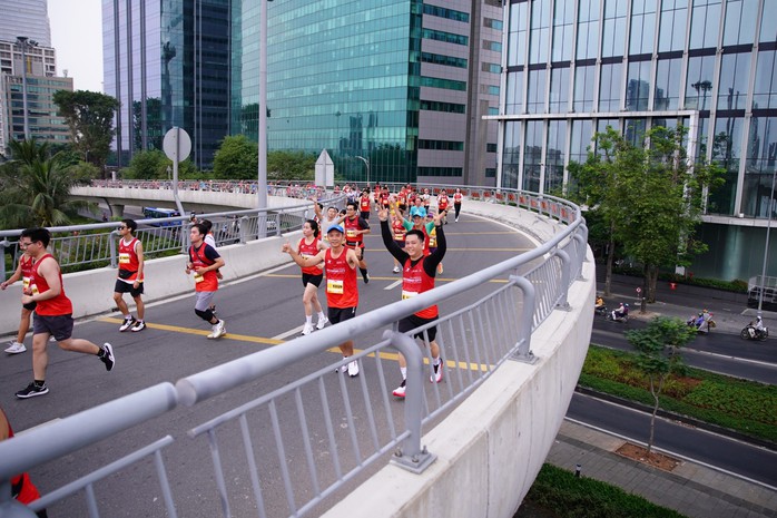 Kỷ lục gần 18.000 vận động viên tham gia giải marathon quốc tế ở TP HCM- Ảnh 4. Kỷ lục gần 18.000 vận động viên tham gia giải marathon quốc tế ở TP HCM- Ảnh 4.