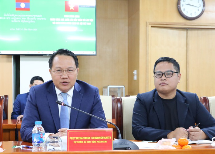 Đoàn cán bộ Ngân hàng Nhà nước Lào thăm và làm việc với NHCSXH- Ảnh 2.