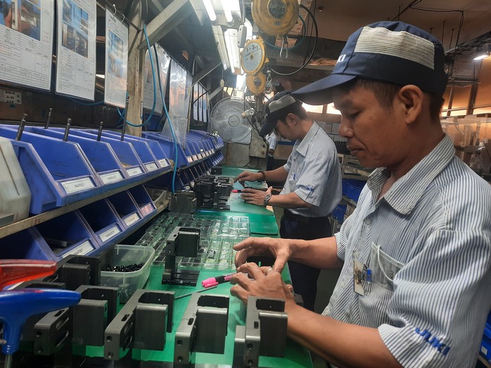 Khoảng 70% doanh nghiệp làm việc trở lại trong mùng 7 Tết- Ảnh 4. Khoảng 70% doanh nghiệp làm việc trở lại trong mùng 7 Tết- Ảnh 4.
