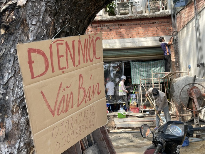 Người dân dỡ nhà, giao mặt bằng làm đường kết nối sân bay Tân Sơn Nhất- Ảnh 2.