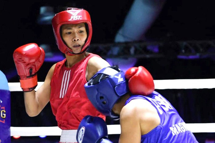 Kim Ánh (trái) giúp quyền Anh nữ Việt Nam có suất dự Olympic 2024 Ảnh: SƠN HẢI Kim Ánh (trái) giúp quyền Anh nữ Việt Nam có suất dự Olympic 2024 Ảnh: SƠN HẢI
