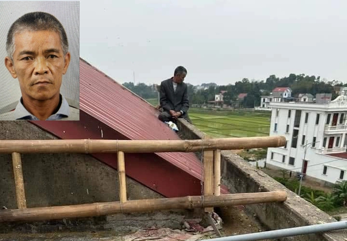 Người đàn ông đâm vợ và mẹ vợ rồi cố thủ trên nóc nhà nghỉ- Ảnh 1. Người đàn ông đâm vợ và mẹ vợ rồi cố thủ trên nóc nhà nghỉ- Ảnh 1.