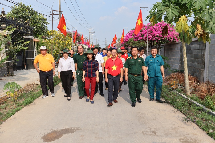 Người dân Củ Chi đón nhận thêm 2 tuyến “Đường cờ Tổ quốc”- Ảnh 4.