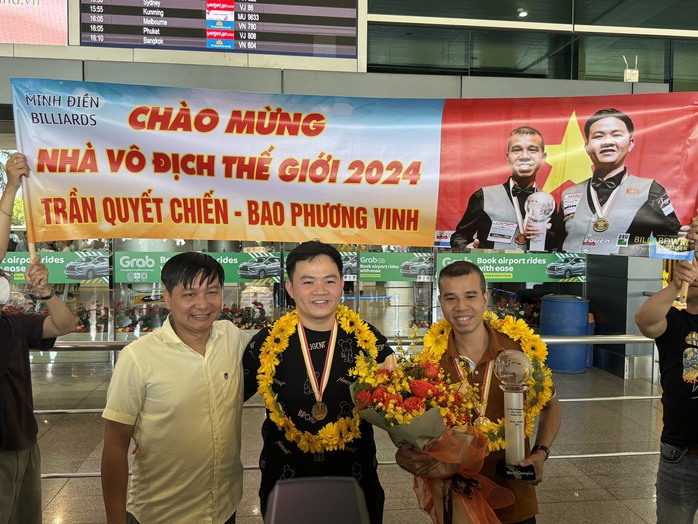 Ngày về của hai nhà vô địch thế giới Trần Quyết Chiến và Bao Phương Vinh- Ảnh 4. Ngày về của hai nhà vô địch thế giới Trần Quyết Chiến và Bao Phương Vinh- Ảnh 4.