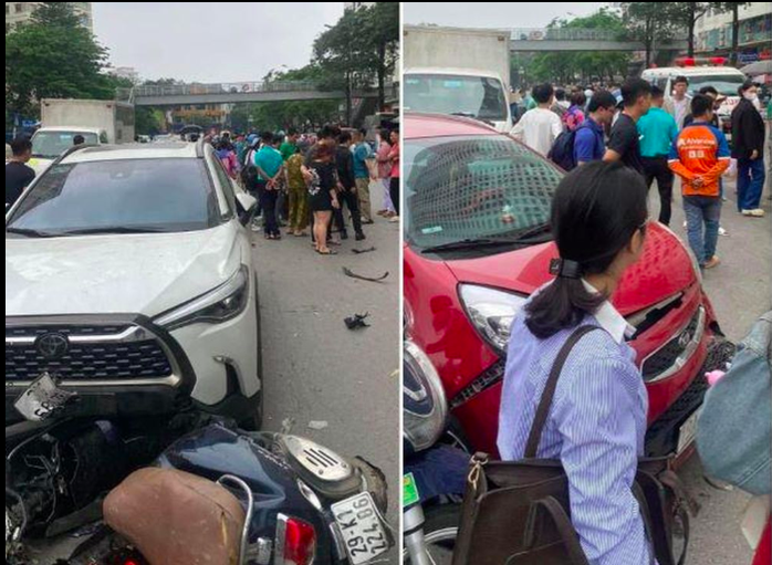 Nữ tài xế bất ngờ tông xe liên hoàn, hất văng nạn nhân lên nắp capo- Ảnh 1. Nữ tài xế bất ngờ tông xe liên hoàn, hất văng nạn nhân lên nắp capo- Ảnh 1.