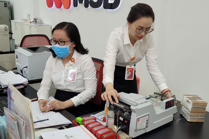 Ngân hàng đủ vốn cho vay nhưng thiếu khách hàng đủ điều kiện Ảnh: TẤN THẠNH Ngân hàng đủ vốn cho vay nhưng thiếu khách hàng đủ điều kiện Ảnh: TẤN THẠNH