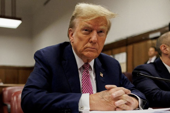 Ông Donald Trump bước vào phiên tòa lịch sử - Ảnh 1.