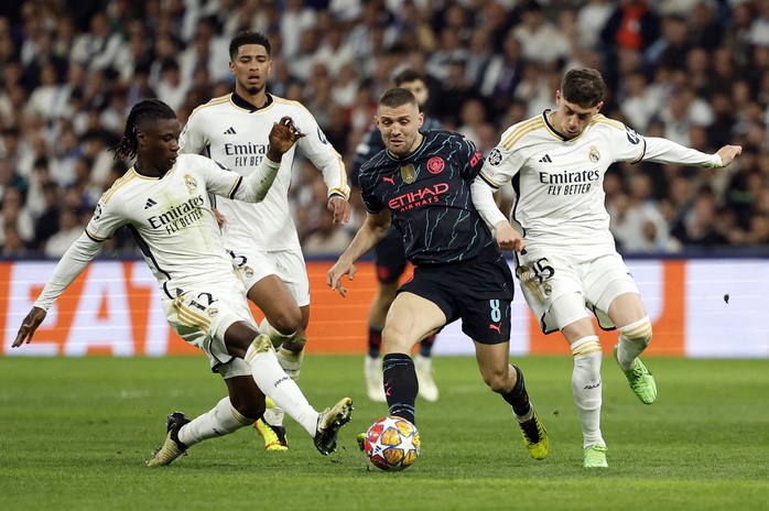 Real Madrid hòa nghẹt thở Man City trong trận đấu 6 bàn thắng- Ảnh 1. Real Madrid hòa nghẹt thở Man City trong trận đấu 6 bàn thắng- Ảnh 1.