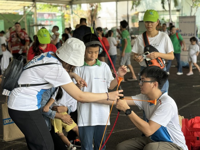 Ngày hội thể thao hòa nhập cho trẻ đặc biệt- Ảnh 3. Ngày hội thể thao hòa nhập cho trẻ đặc biệt- Ảnh 3.