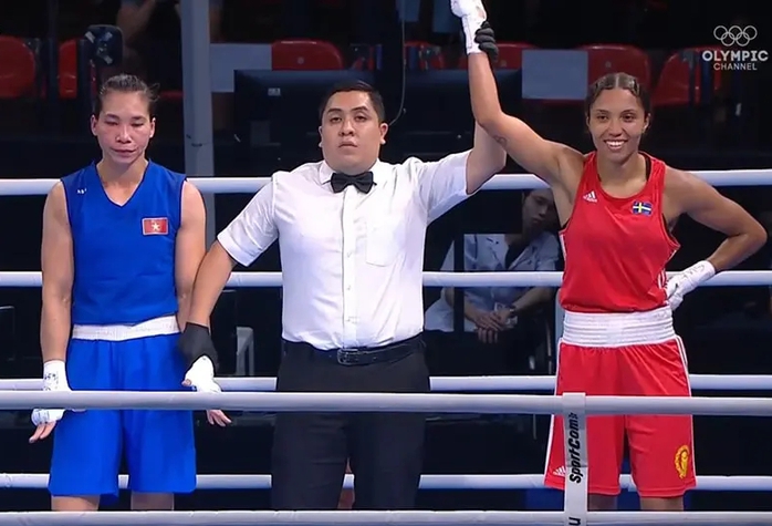 Nữ võ sĩ người dân tộc Tày Hà Thị Linh giành vé tham dự Olympic Paris- Ảnh 2. Nữ võ sĩ người dân tộc Tày Hà Thị Linh giành vé tham dự Olympic Paris- Ảnh 2.