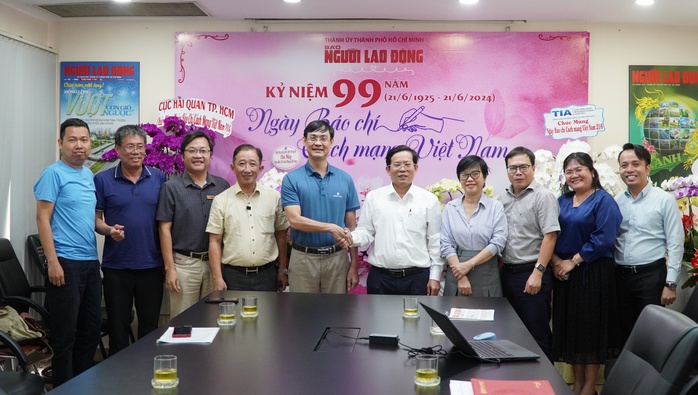Báo Hải Phòng mong muốn hợp tác với Báo Người Lao Động trong làm báo đa phương tiện - Ảnh 1. Báo Hải Phòng mong muốn hợp tác với Báo Người Lao Động trong làm báo đa phương tiện - Ảnh 1.