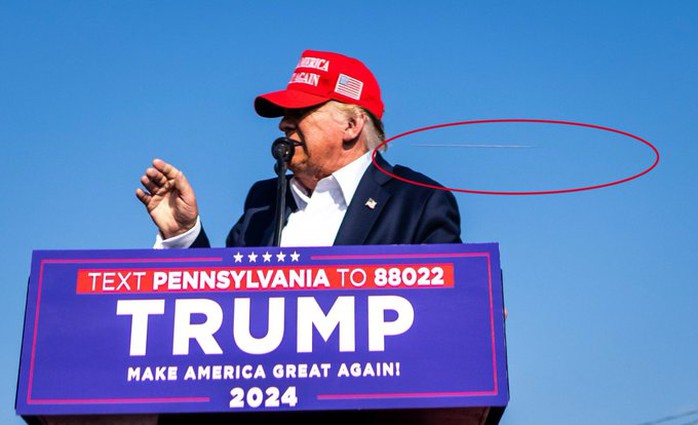 Bức ảnh có một không hai: Viên đạn bay sượt đầu ông Trump- Ảnh 1. Bức ảnh có một không hai: Viên đạn bay sượt đầu ông Trump- Ảnh 1.