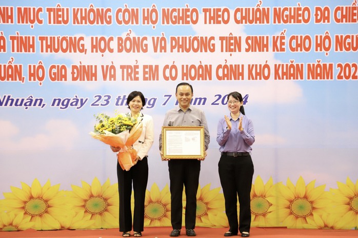 TP HCM: Thêm 1 quận không còn hộ nghèo theo chuẩn nghèo đa chiều- Ảnh 1. TP HCM: Thêm 1 quận không còn hộ nghèo theo chuẩn nghèo đa chiều- Ảnh 1.