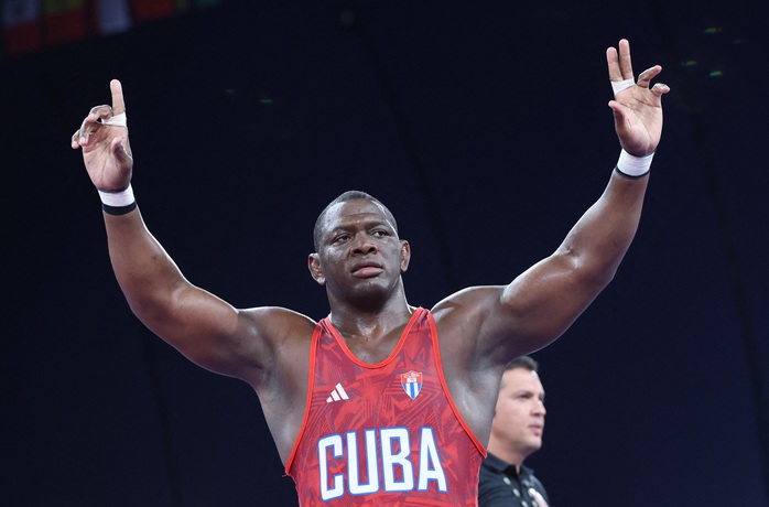 "Siêu võ sĩ" Mijain Lopez Nuñez – VĐV đầu tiên giành HCV tại 5 kỳ Olympic- Ảnh 4. "Siêu võ sĩ" Mijain Lopez Nuñez – VĐV đầu tiên giành HCV tại 5 kỳ Olympic- Ảnh 4.