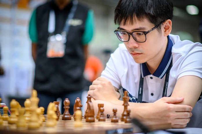 Lê Quang Liêm thắng nhà vô địch thế giới, tuyển Việt Nam bất bại tại Olympiad cờ vua 2024- Ảnh 3. Lê Quang Liêm thắng nhà vô địch thế giới, tuyển Việt Nam bất bại tại Olympiad cờ vua 2024- Ảnh 3.