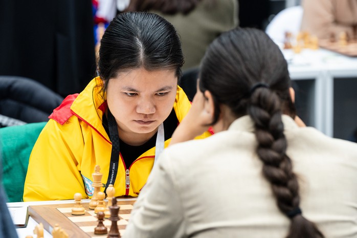 Lê Quang Liêm thắng nhà vô địch thế giới, tuyển Việt Nam bất bại tại Olympiad cờ vua 2024- Ảnh 8. Lê Quang Liêm thắng nhà vô địch thế giới, tuyển Việt Nam bất bại tại Olympiad cờ vua 2024- Ảnh 8.