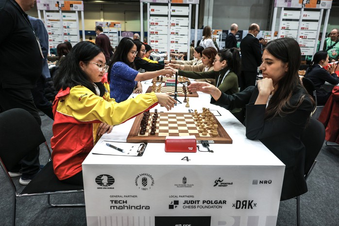 Lê Quang Liêm thắng nhà vô địch thế giới, tuyển Việt Nam bất bại tại Olympiad cờ vua 2024- Ảnh 7. Lê Quang Liêm thắng nhà vô địch thế giới, tuyển Việt Nam bất bại tại Olympiad cờ vua 2024- Ảnh 7.
