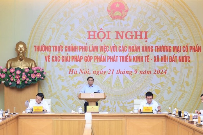 Thủ tướng mong ngân hàng thương mại cổ phần chia sẻ với người dân, doanh nghiệp trong khó khăn- Ảnh 1. Thủ tướng mong ngân hàng thương mại cổ phần chia sẻ với người dân, doanh nghiệp trong khó khăn- Ảnh 1.