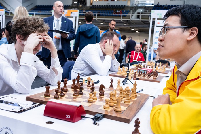Tuyển Việt Nam lỡ cơ hội bay cao tại vòng áp chót Olympiad cờ vua- Ảnh 1. Tuyển Việt Nam lỡ cơ hội bay cao tại vòng áp chót Olympiad cờ vua- Ảnh 1.
