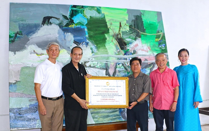 Đấu giá bức tranh hơn 1,1 tỉ đồng để giúp đỡ đồng bào bị bão lũ- Ảnh 1.