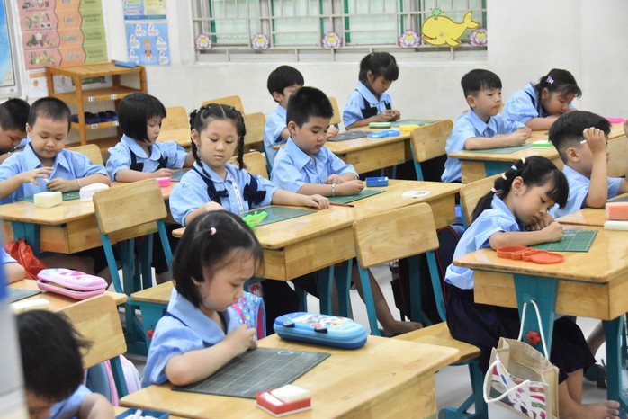 Học sinh lớp một Trường Tiểu học Nguyễn Thi, quận 11, TP HCM vào năm học mới. Ảnh: TẤN THẠNH Học sinh lớp một Trường Tiểu học Nguyễn Thi, quận 11, TP HCM vào năm học mới. Ảnh: TẤN THẠNH