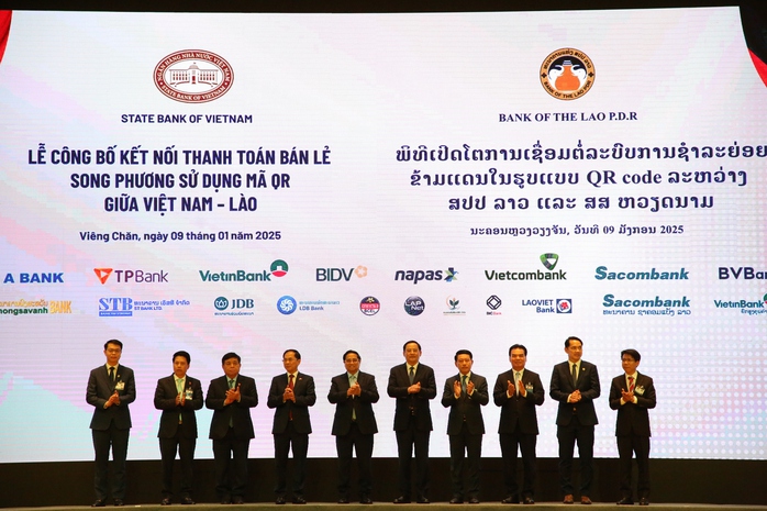 Nghi thức ra mắt dịch vụ thanh toán bán lẻ song phương sử dụng mã QR giữa Việt Nam và Lào Nghi thức ra mắt dịch vụ thanh toán bán lẻ song phương sử dụng mã QR giữa Việt Nam và Lào