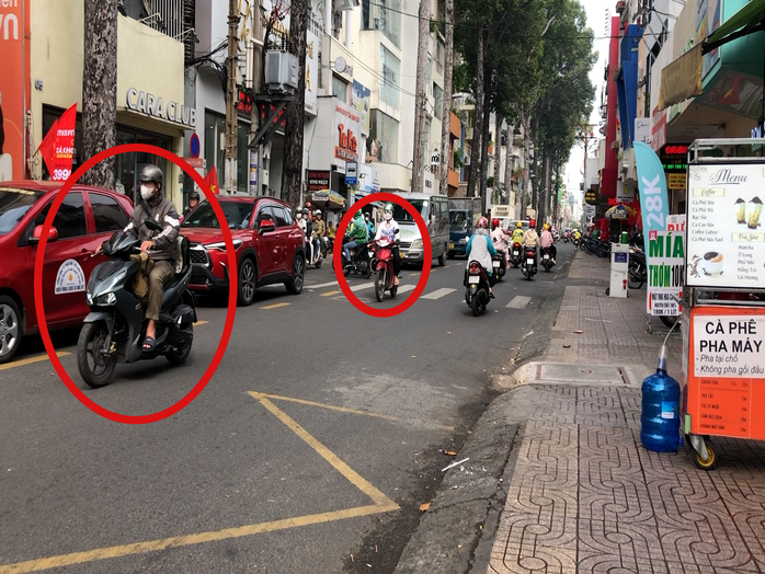 Hình ảnh bất chấp mức phạt khủng, nhiều người ở TP HCM vẫn vi phạm luật giao thông- Ảnh 6. Hình ảnh bất chấp mức phạt khủng, nhiều người ở TP HCM vẫn vi phạm luật giao thông- Ảnh 6.