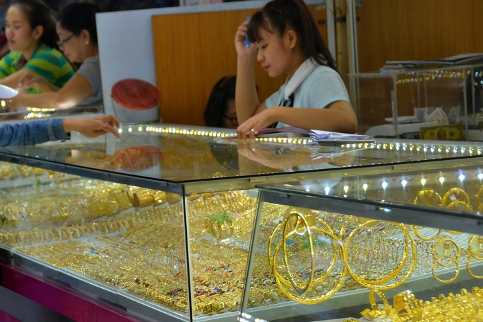 Giá vàng hôm nay 20-1: Vàng miếng SJC, vàng nhẫn đồng loạt giảm- Ảnh 1. Giá vàng hôm nay 20-1: Vàng miếng SJC, vàng nhẫn đồng loạt giảm- Ảnh 1.