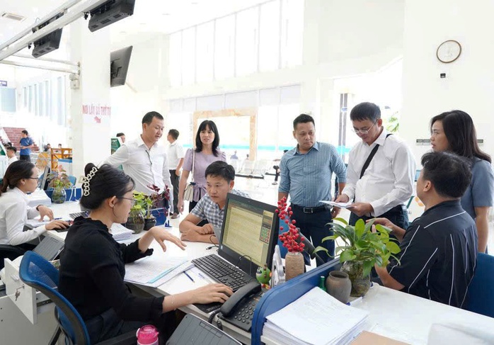 Chính quyền hai cấp ở Quảng Ngãi: Quyết liệt số hóa, gỡ vướng tận nơi - Ảnh 3.
