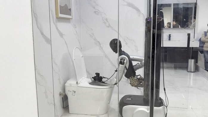 Robot Trung Quốc khiến thế giới sững sờ: Từ cọ bồn cầu đến chơi đàn piano như nghệ sĩ  - Ảnh 2.