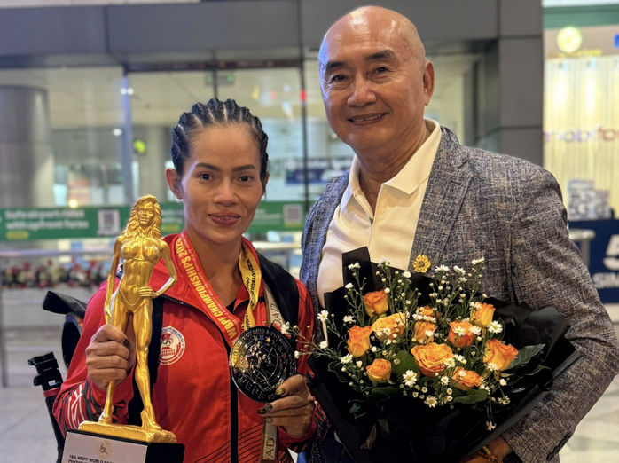 Ngày về rạng rỡ của đội tuyển thể hình với ngôi á quân thế giới - Ảnh 1.