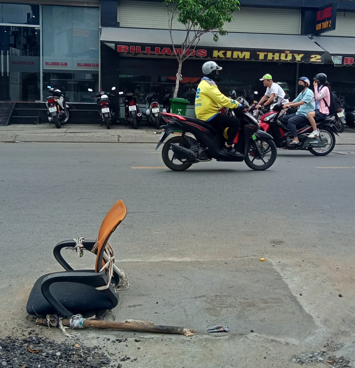PHẢN HỒI: Đã trám hố sâu - Ảnh 1.