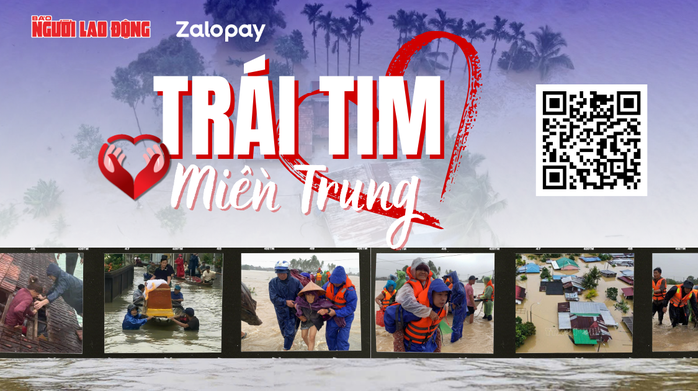 Báo Người Lao Động trao tiền hỗ trợ cho gia đình nạn nhân tử vong trong lũ lụt - Ảnh 1.