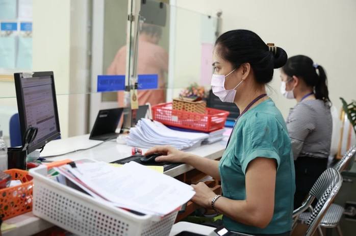 Kéo dài thời gian giải quyết chế độ nghỉ việc cho lao động ngoài biên chế - Ảnh 1.