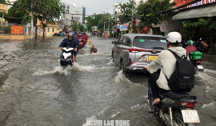 Khi n&agrave;o TPHCM kiểm so&aacute;t được 159 điểm ngập? - Ảnh 1.